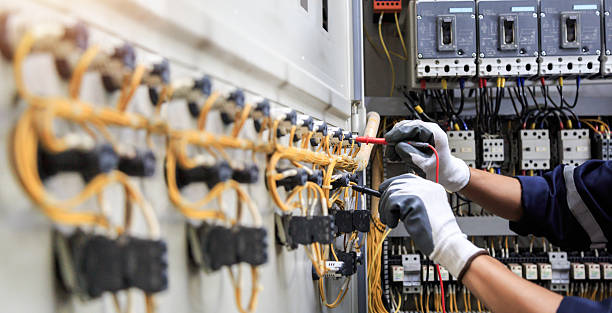 Professional Electrician technician working in Home Garden, CA